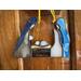 Nativity ornament- light skin- hanging on a wall.