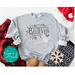 Monochromatic Believe Christmas Sweatshirt – Minimalist Holiday Style for Cozy Winter Days