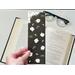 this flower book mark is laminated