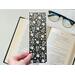 the flower book mark is laminated