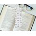 this bookish laminated bookmark is in a real life setting
