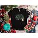 Magical Believe Christmas Shirt: Perfect for Holiday Train Rides and Festive Gatherings