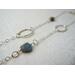 Long 35 inch sterling silver and labradorite necklace with hand made silver circle links and faceted labradorite nuggets.