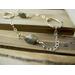 Long 35 inch sterling silver and labradorite necklace with hand made silver circle links and faceted labradorite nuggets.