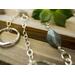 Long 35 inch sterling silver and labradorite necklace with hand made silver circle links and faceted labradorite nuggets.