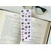 Barista book mark in a real life setting on a nightstand