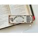 This bookmark looks like a ticket in color dark and light brown. In the center says 'Books & Coffee, Book Lover, Lifetime Member' with stack of book on the left and coffee bottom by book lovers. there are gold boarders at each corner