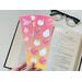 both Halloween bookmarks are laminated and both have ombre background starting with pink going into yellow