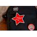 close up view of wooden please, im a star red brooch pin on bag, pearl horror movie inspired pin, gift for horror movie fans