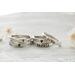 Free formed organic shaped sterling silver ring stamped with name and hearts.