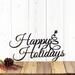 Happy Holidays metal wall art with Christmas tree, in matte black powder coat.