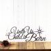 Unto Us A Child Is Born metal wall art with Christmas star, in raw steel.