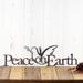 Christmas peace on earth metal wall decor with peace dove silhouette, in silver vein powder coat.