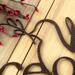 Close up of copper vein powder coat on our Peace on Earth metal wall art.