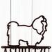 Close up of Shih Tzu dog silhouette on our A Shih Tzu Lives Here metal sign, in copper vein powder coat.