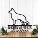 German Shepherds Live Here metal wall art, in matte black powder coat.