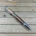Dark wood pen