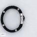 Braided Leather Bands adorned with a spooky skull clasp - Jon B Leather