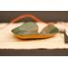6x6" heart shaped plate with Hosta plant texture. Glazed with a dark green rim and a mixture of blue and grey throughout the middle. 