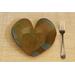 Heart shaped dinner plate with Hosta plant texture. Variegated glaze in blue around edges and olive green in the middle. 8"x9"
