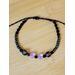 single beaded bracelet featuring 8mm lavender and black frosted beads,
