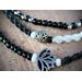 closeup beaded macrame wristwear