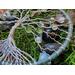 right side of tree shows flowing roots aligned beautifully with twisted wire trunk