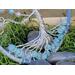 details of wire twisted tree trunk as it follows through to the wire roots decorated with 8mm glass beads