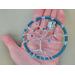 i'm holding the turquoise tree in my hand. It is 3inches and fits nicely in my palm. Light blue color cotton yarn wrapped hoop