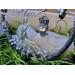 close up tree roots accented with clear crystal glass beads in addition to silver seed beads