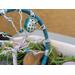close up glass beaded wire twiseted branches, showcasing cute chunky ceramic owl 