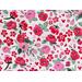 a close of the tiny red and pink flowers and hearts