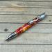 red and gold dragon pen