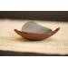 Ceramic heart shaped spoon rest. Glazed in red and blue. Approximately 3"x3.5"