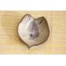 Ceramic heart shaped spoon rest. Glazed in grayish blue and purple colors. Approximately 3"x3.5"