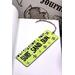 Front of bookmark with lime green background, black handwritten lettering, starfish, turtles and jute rope tassel.