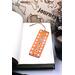 Front of bookmark  - orange background, hand painted paw print along sides, various dot art designs top, middle & bottom.  Jute rope tassel