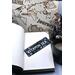Front of bookmark with dot art designs, starfish, turtles and jute rope tassel