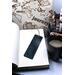 Back of bookmark in solid black with jute rope tassel
