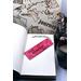 Front of bookmark hot pink background, black handwritten lettering, turtles, starfish, various dot art.  Jute rope tassel.