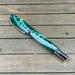 swamp green pen