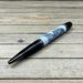 Scrimshaw art on a ballpoint pen