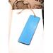 Back of bookmark in solid light blue with jute rope tassel.