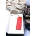 Back of bookmark in solid red with jute rope tassel.