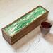 Wooden tea box holds 50 tea bags. Bright green and white  swirls with glossy resin finish. Great gift for tea lovers, or wedding.