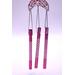 Close up of pink metal chimes and silver line