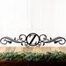 Metal monogram sign with vines, in matte black powder coat.