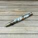 Antique brass USPS postage stamp pen