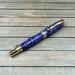 purple stabilized wood pen with gold and chrome hardware 