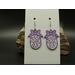 Machine embroidered earrings -white egg with purple swirls, ribbon and edges. Silver hypoallergenic hooks.